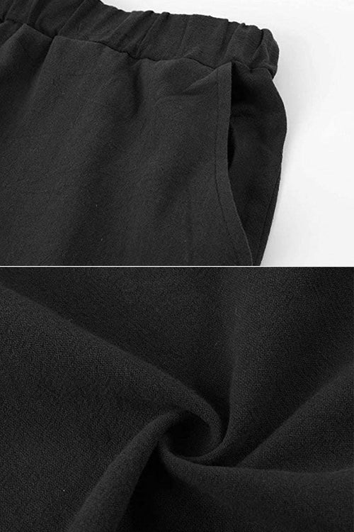 close-up of black 100% cotton linen fabric with elastic waistband and pocket detail in two-piece set