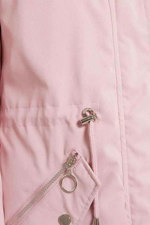 Close-up of pink thick long-sleeve zipper overcoat with metal zipper and adjustable drawstring detail