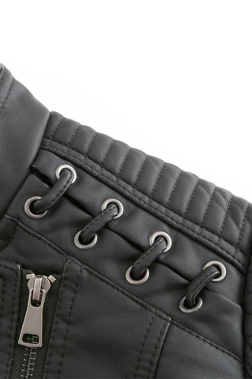 Close-up of slim fit leather motorcycle jacket with quilted shoulder and zipper details