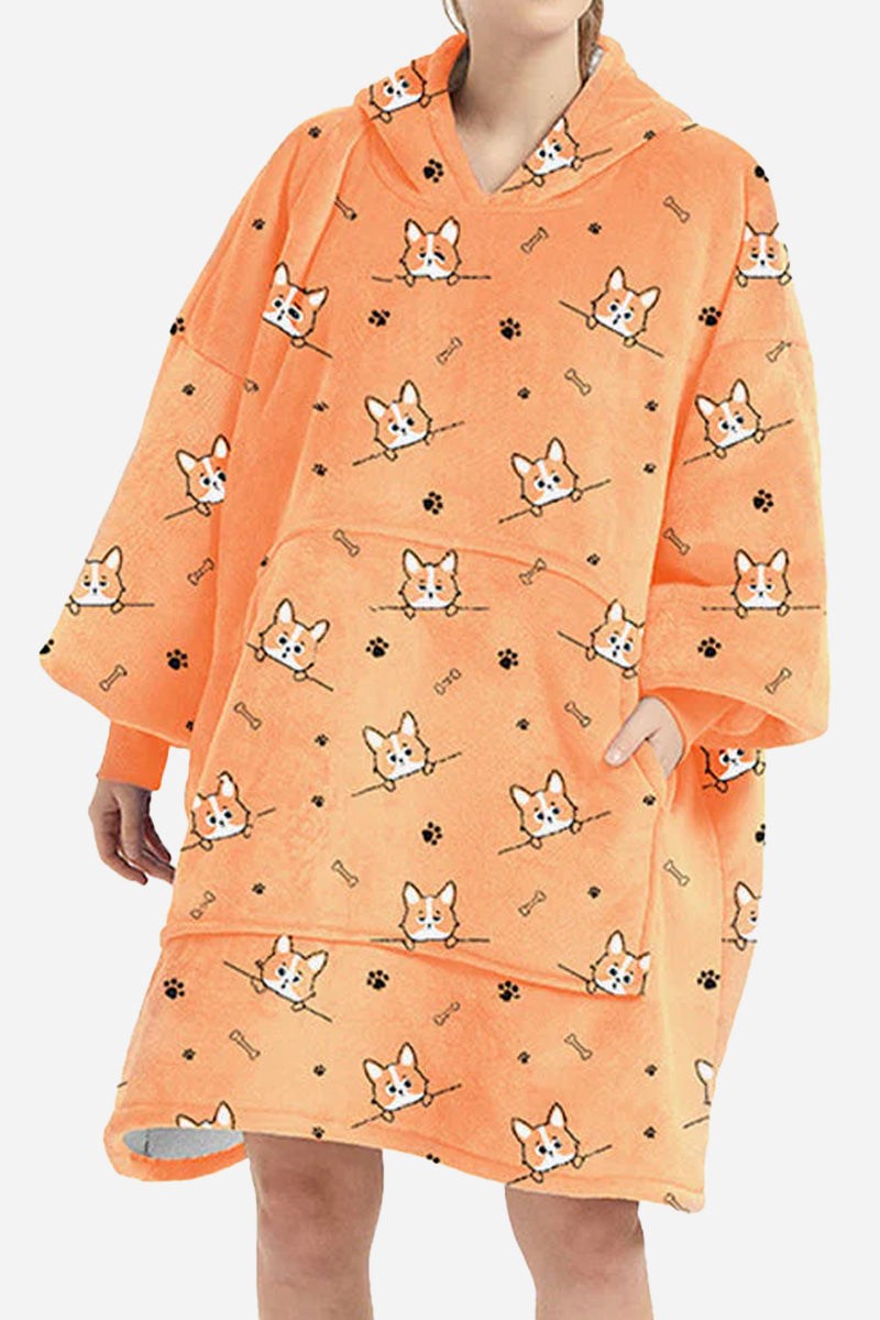 Snuggly oversized hooded fleece sweater with dog print, soft flannel and sherpa material, extra warm and cozy design.