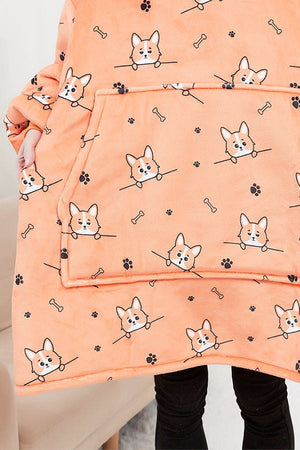 Snuggly oversized hooded fleece sweater with cartoon dog print, front pocket, and soft warm material.