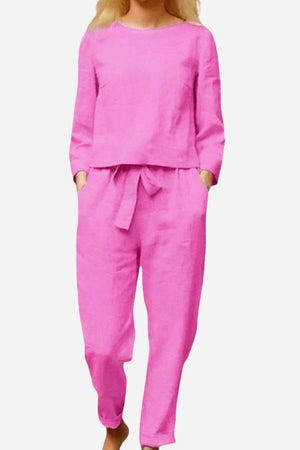 Retro Monochrome Linen two-piece set in bright pink linen fabric with long sleeves and relaxed fit pants.