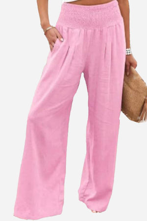 Pink high-waist cotton linen palazzo pants with wide legs and smocked waistband.