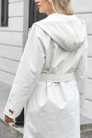 Back view of a white water-resistant windbreaker trench jacket with a hood and belt