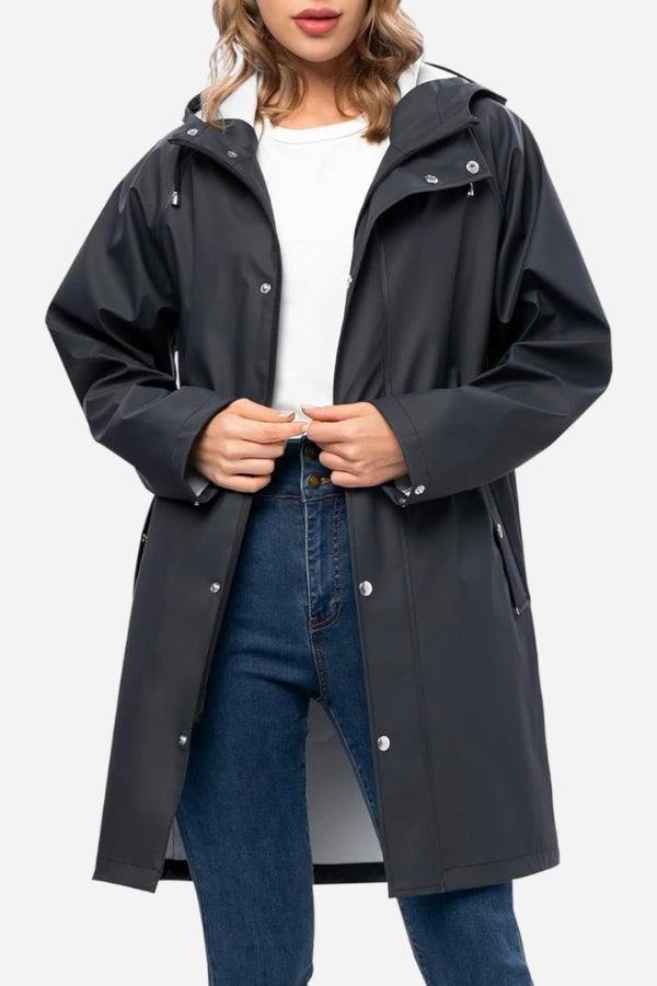 Lightweight ultra water-resistant long black windbreaker jacket with hood and slim fit design for women