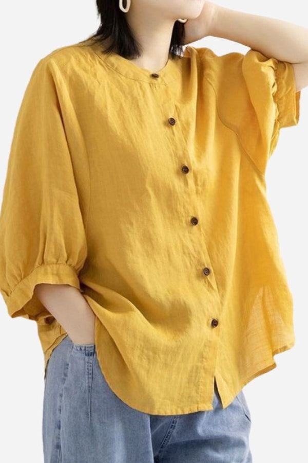 Relaxed loose breathable linen blouse in mustard yellow with button-down front and 3/4 sleeves
