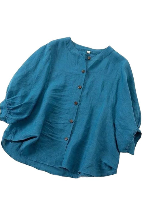 Relaxed loose breathable linen blouse in vibrant blue with button-down front and soft fabric for summer comfort