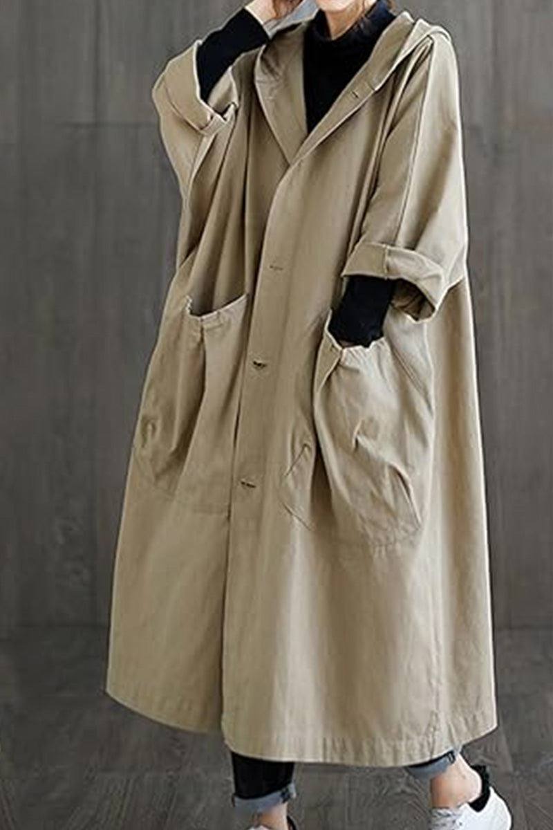 oversized beige water resistant windbreaker jacket with pockets and long sleeves for layering