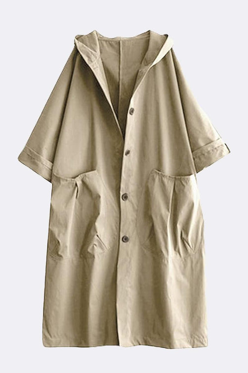 Oversized water resistant windbreaker jacket with hood and front pockets in beige color