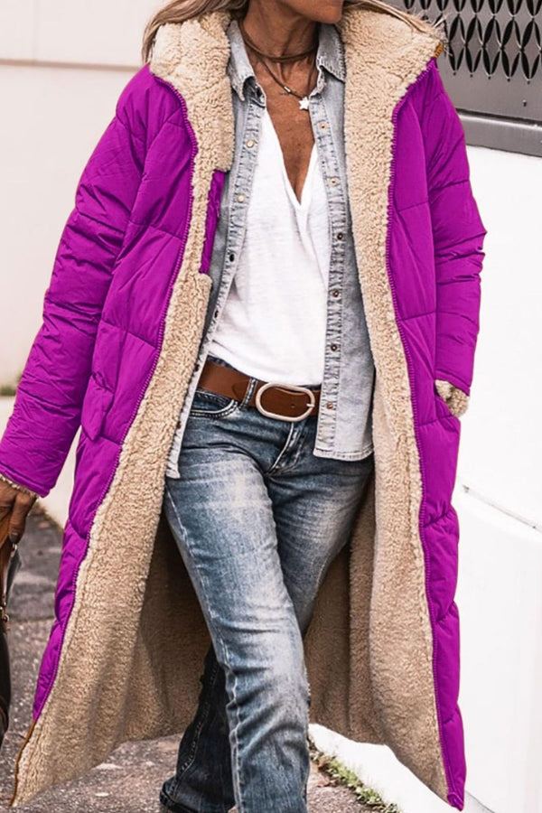 Long purple Sherpa-lined hooded teddy coat with plush interior and durable puffer exterior worn open over casual outfit