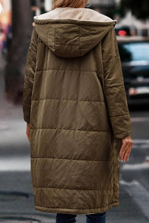 Back view of a Sherpa-Lined Hooded Teddy Coat in olive green with quilted puffer design and hood, worn outdoors.