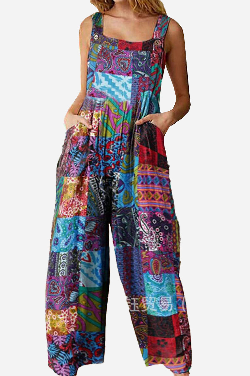 Woman wearing colorful patchwork Bohemian Fantasy Overalls with square neckline and wide legs