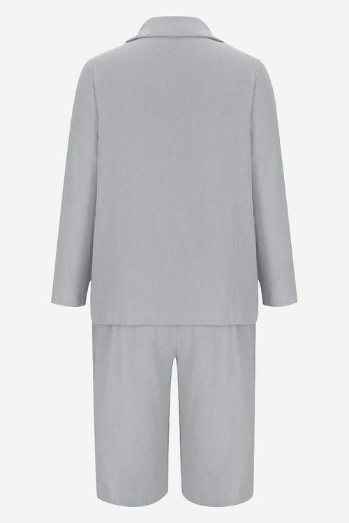 Gray blazer and high-waisted shorts two-piece set back view