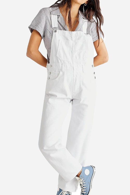 White denim-look tapered-leg adjustable bib overalls with pockets and button details.