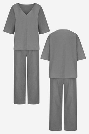 Grey V-neck cotton two-piece trouser set with mid-length sleeves and straight-leg pants, front and back views.
