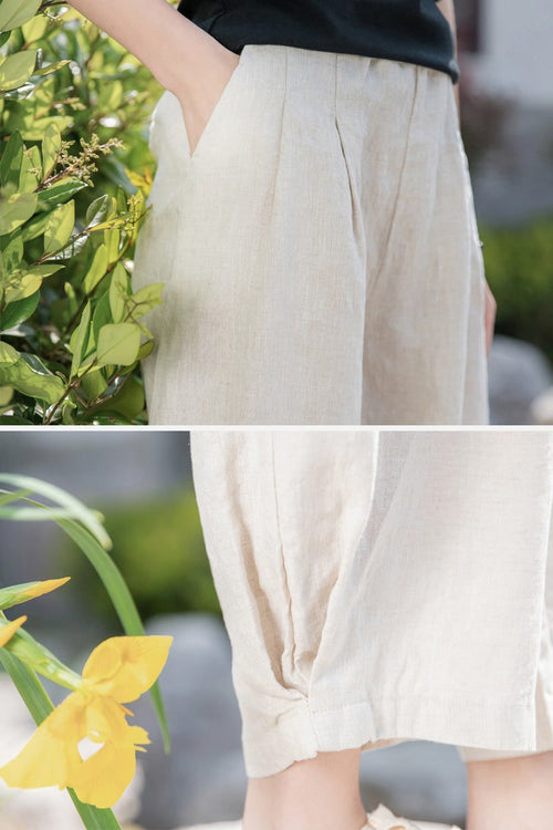 Close-up photo of beige Ramie Linen Cotton Pants featuring breathable lightweight fabric and relaxed fit with side pockets and cuffed hems.