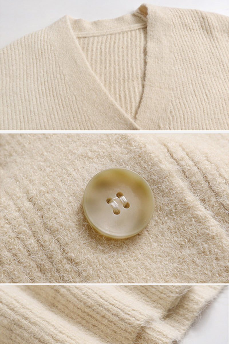 Close-up details of a beige casual loose boxy cardigan with V-neckline, ribbed texture, and button closure