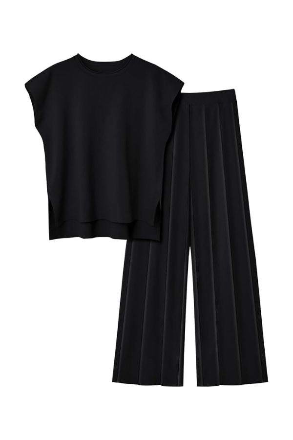 First Class Travel Two-Piece Set in black with pleated wide-leg pants and structured top