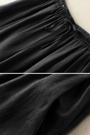 Black cotton linen Tuscany wide-leg trousers with elastic waistband and drawstring detail