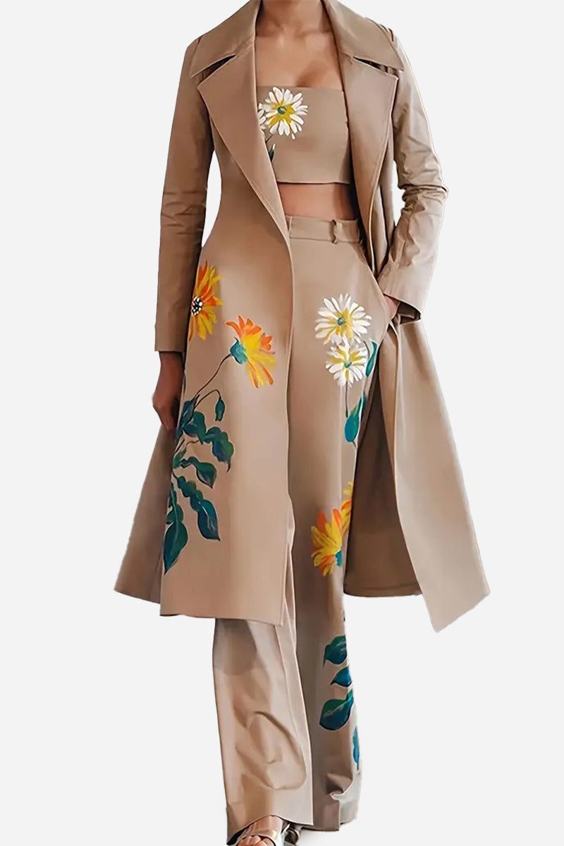 Elegant beige three-piece floral set with strapless top, pants, and long coat adorned with bright flower prints
