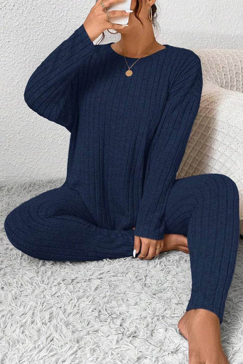 Body Confident Oversized Knit two-piece set in navy blue, cozy ribbed knit fabric, relaxed fit sweater and pants lounge outfit.