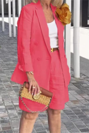 Stylish blazer and shorts two-piece set in vibrant coral with tailored fit, perfect for elegant comfort and versatile wear.