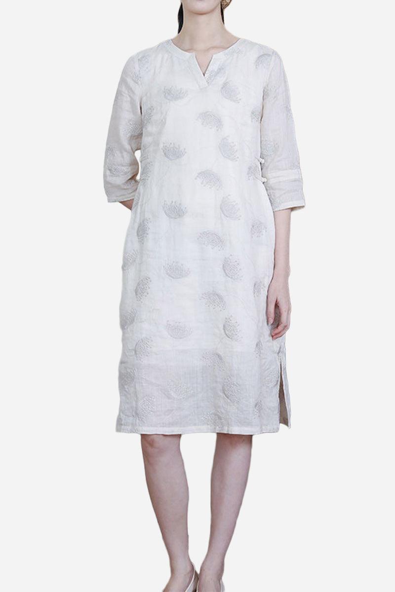 White 100 linen dress with embroidered notch neck and 3/4 sleeves, midi length, breathable and relaxed fit.