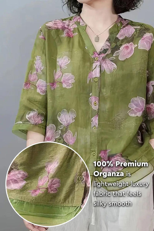 French boutique style organza blouse with pink floral print on lightweight silky green fabric