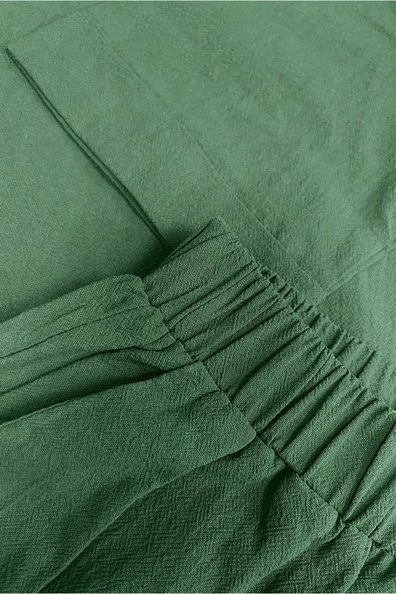 100% cotton green two-piece set with round neck top and wide-leg pants, soft breathable fabric, comfortable fit for travel and casual wear