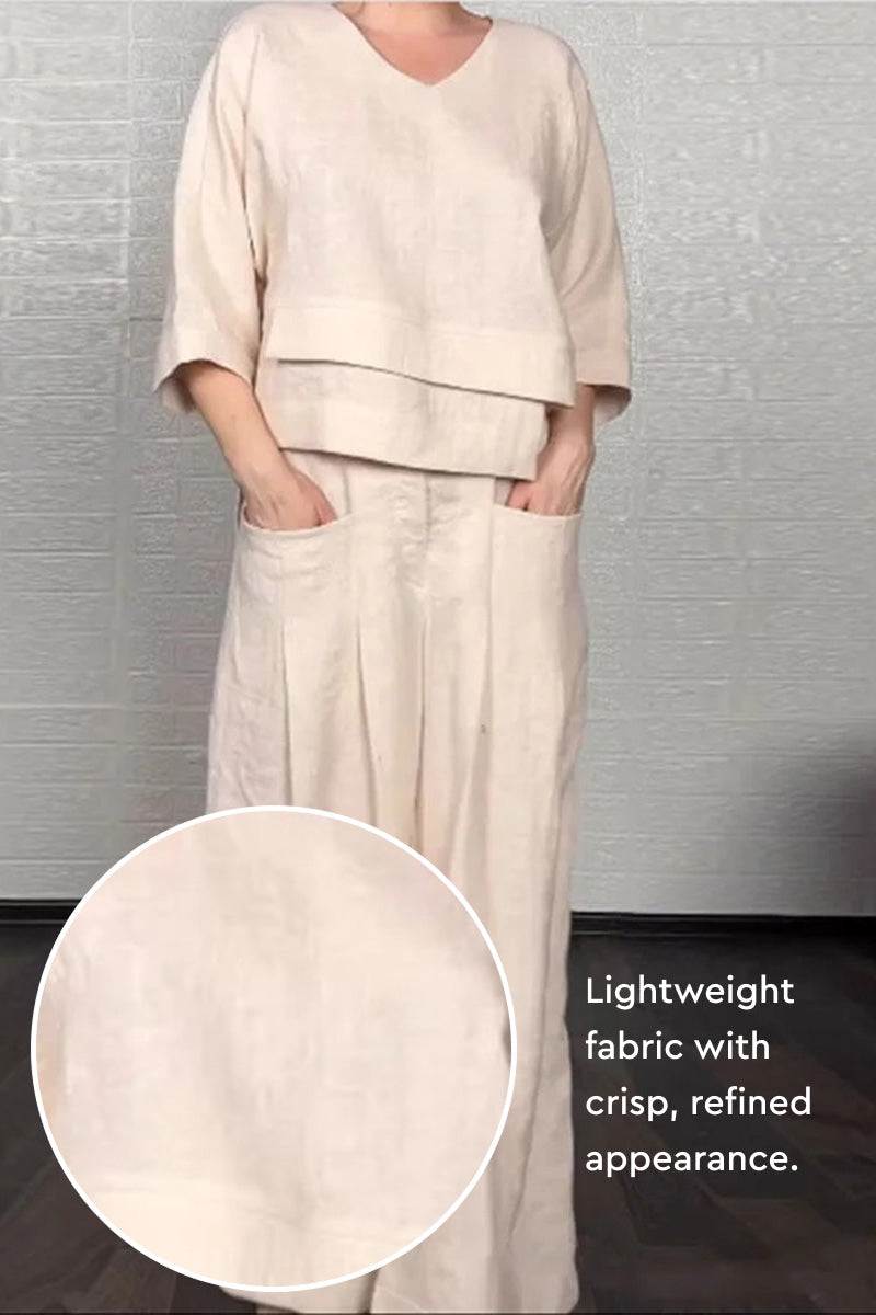 Atelier Serenity Layered Two-Piece Set featuring breathable, lightweight fabric with layered V-neck top and wide-leg trousers in a neutral tone.