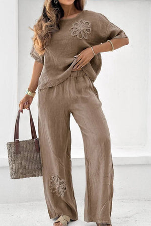 Brown flowy two piece set with floral embroidery and wide-leg pants for comfortable stylish wear