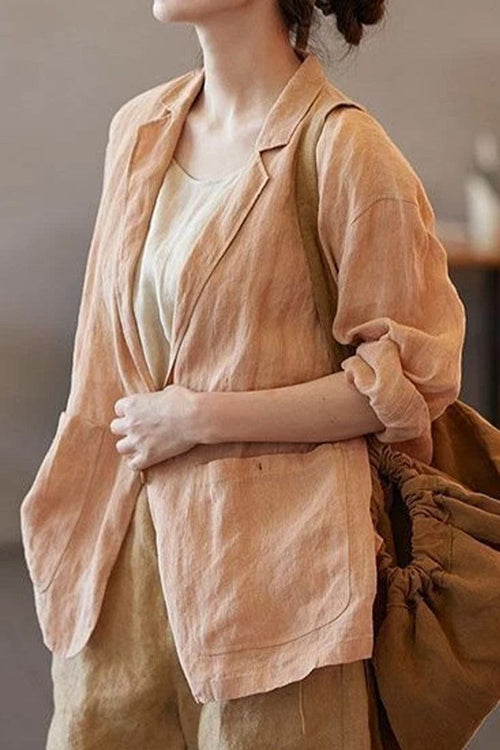 Women's peach linen jacket shirt with notched lapel collar and functional pockets, perfect lightweight layering piece.