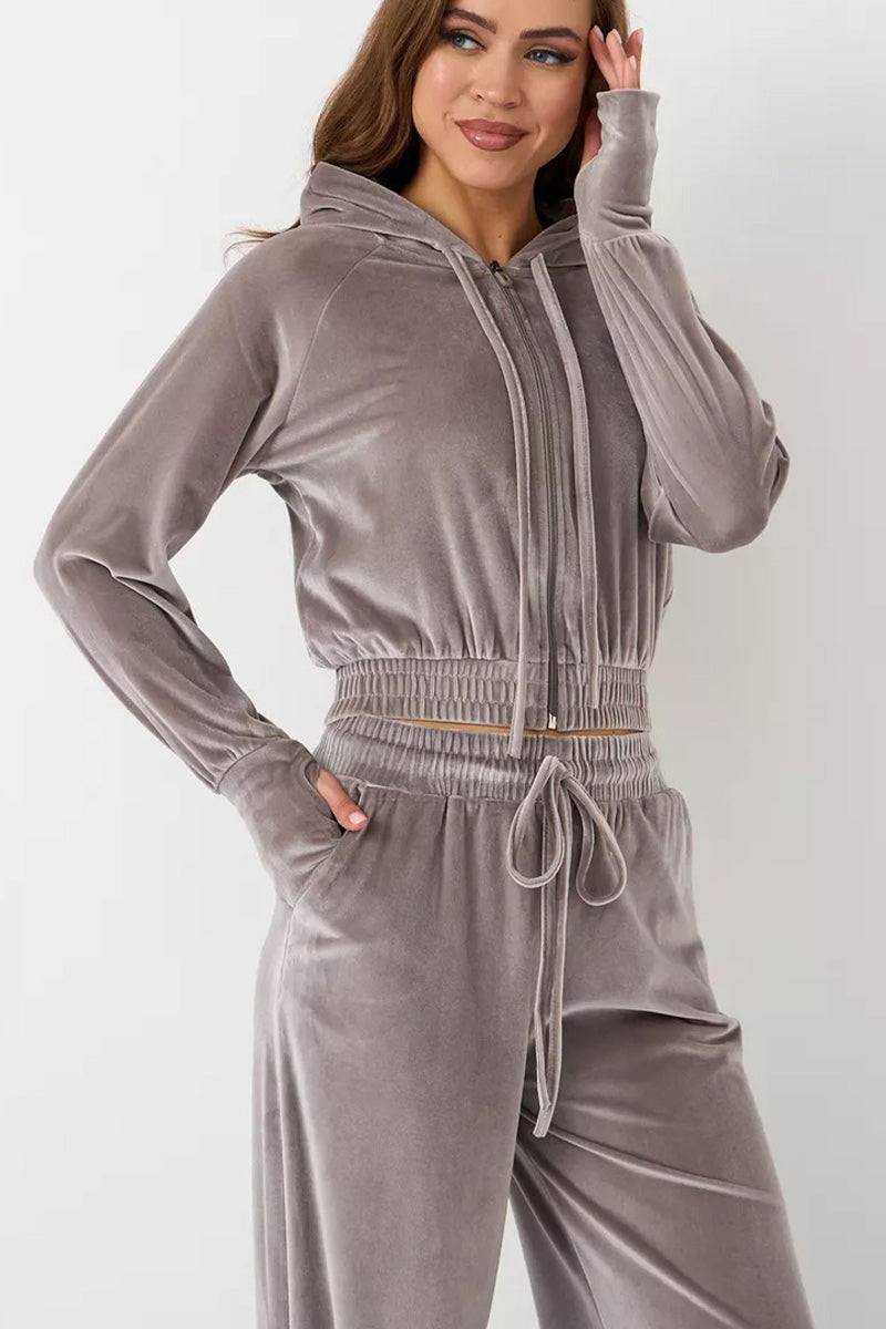 Women's modern cropped velour tracksuit set with high-waist drawstring pants in soft plush fabric