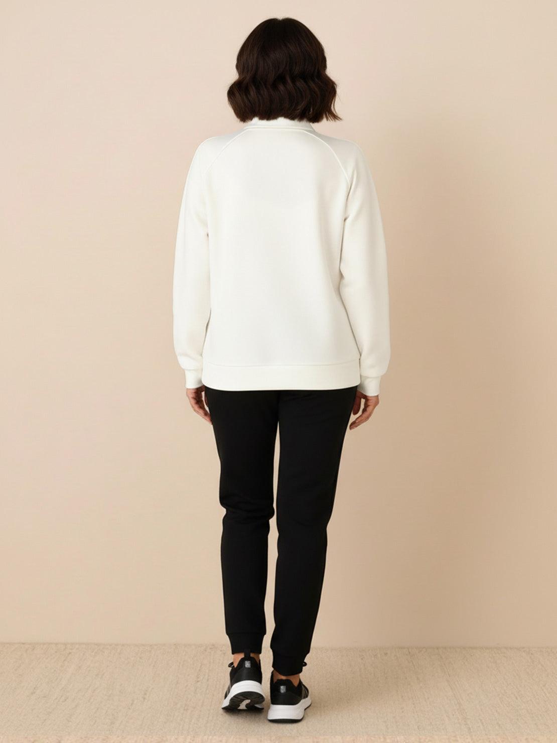 Woman wearing Colorblock Comfort Tracksuit with contrast curved panels and relaxed fit