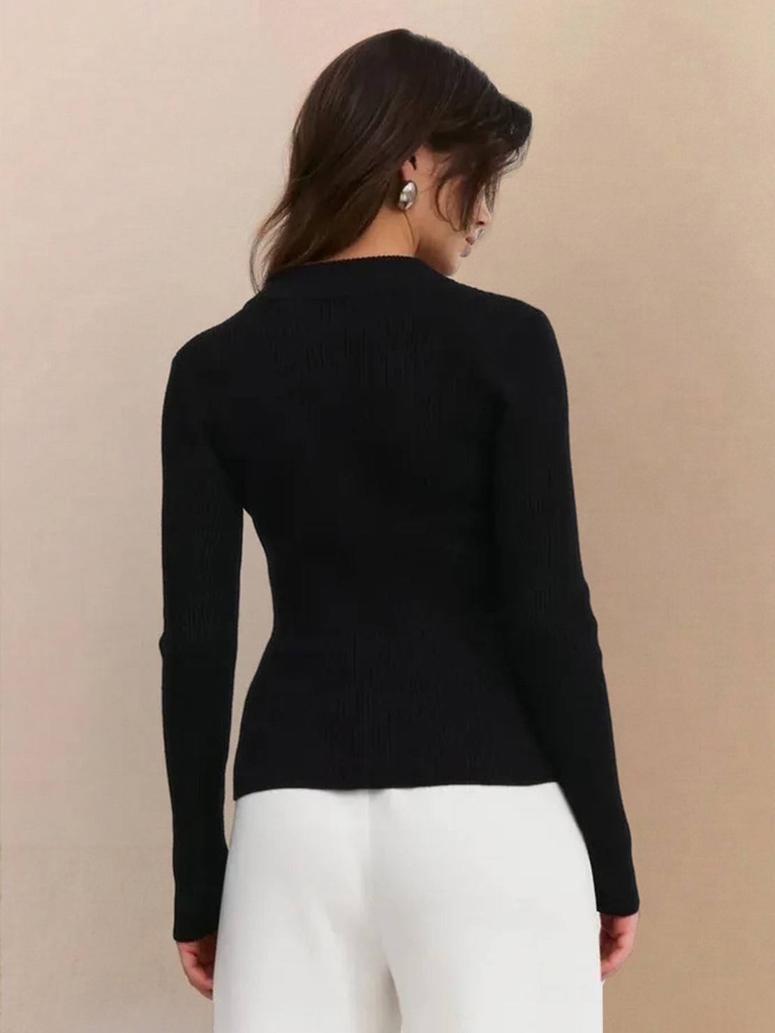 Gray zip-up knit cardigan jacket with vertical ribbing and high neckline on mannequin