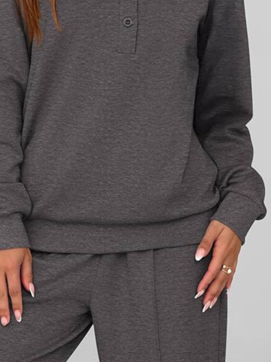 Wrinkle-free polo set with quarter-button top and high-waisted pants in breathable, structured fabric