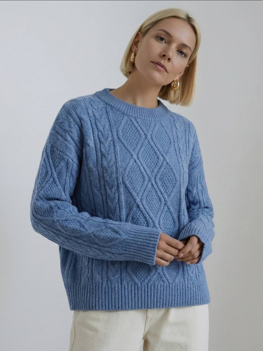 oversized cable-knit crewneck sweater with dropped shoulders and ribbed trims