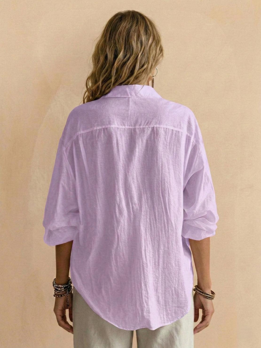 Lightweight 100% cotton popover blouse with relaxed fit, classic collar, and tunic length for casual style