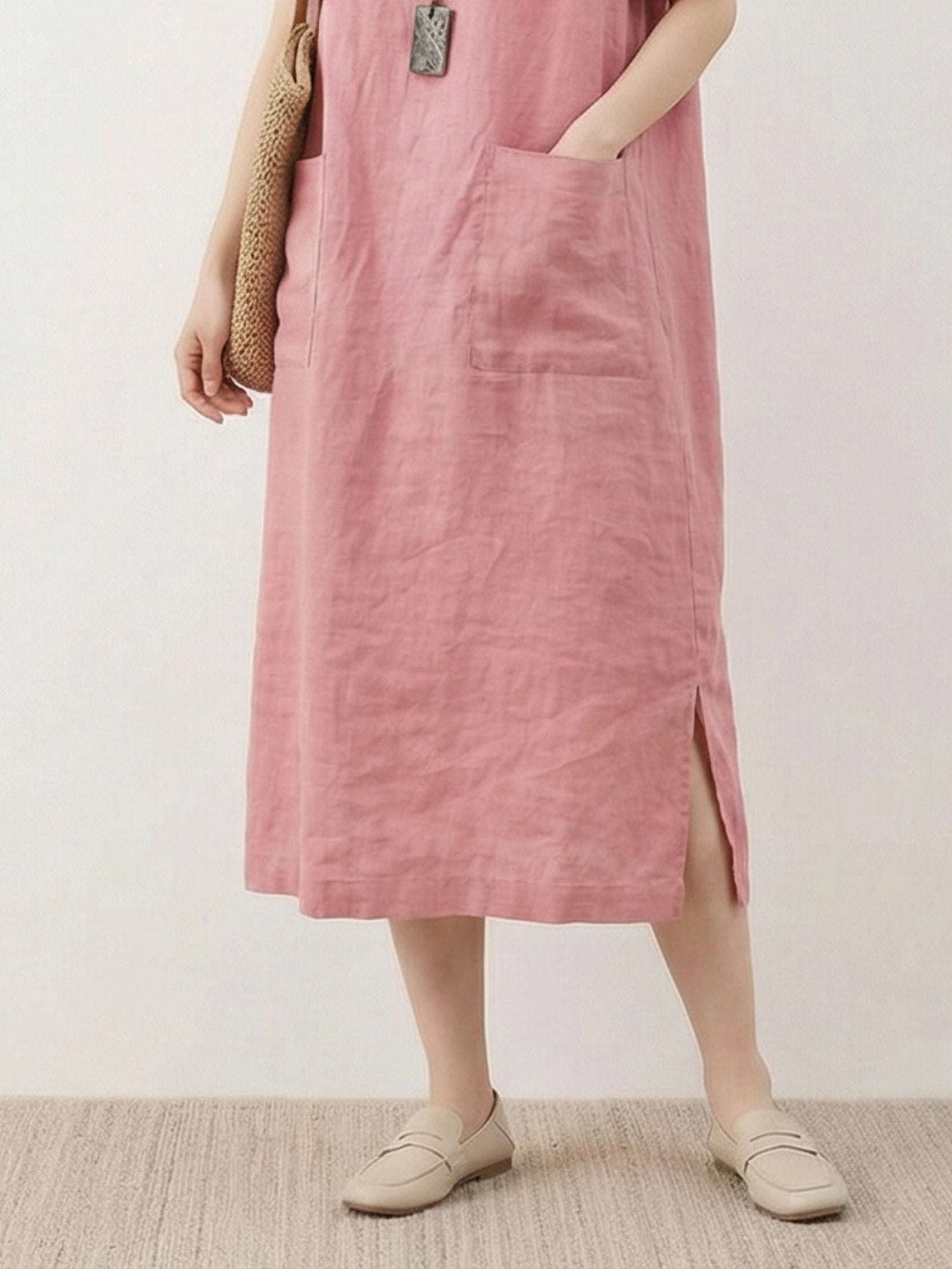 100% linen relaxed midi dress with short sleeves and large front pockets