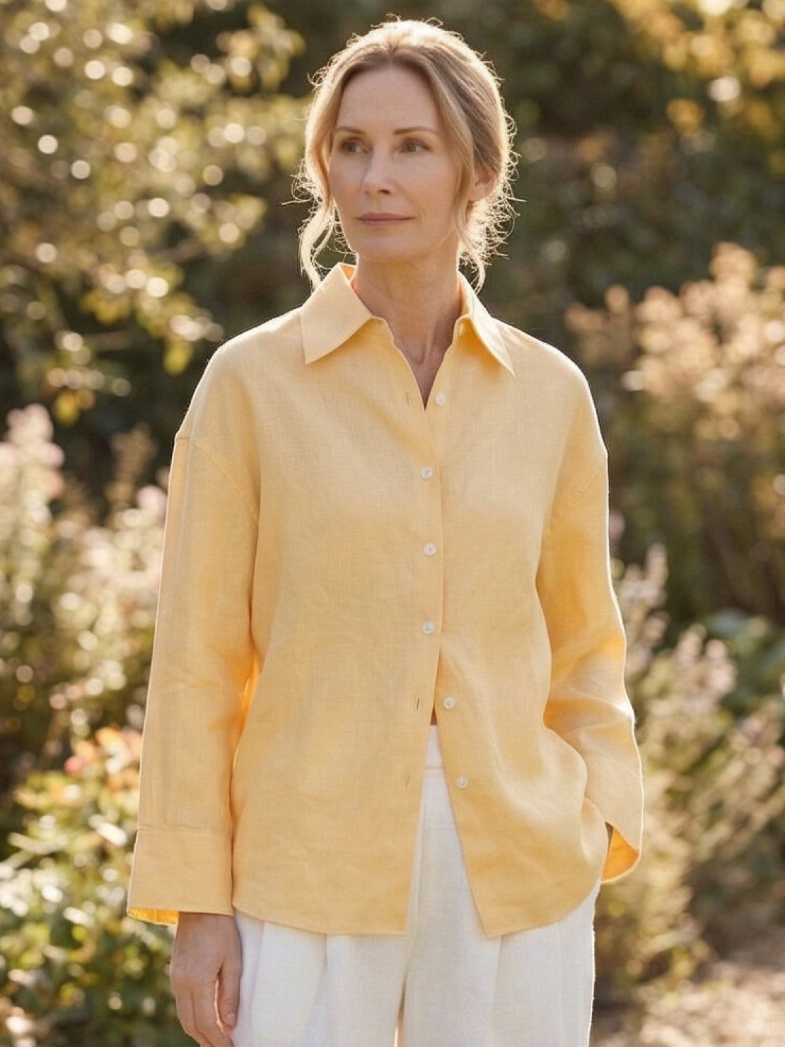 Loose fit 100% linen dropped-shoulder shirt with button front and rollable sleeves