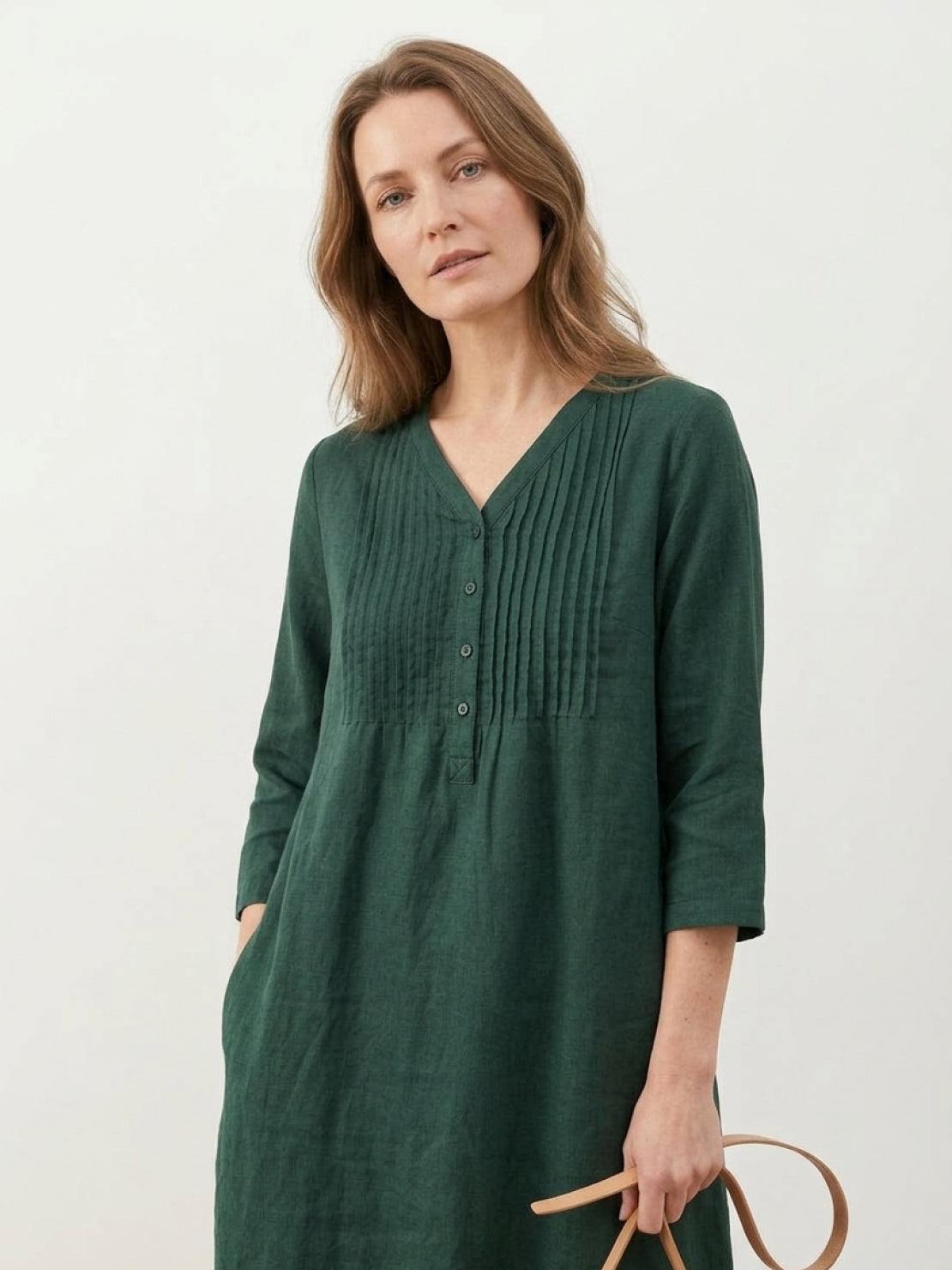 Relaxed A-line 100% cotton linen dress with pintuck pleats, V-neck, 3/4 sleeves, side slits, and pockets