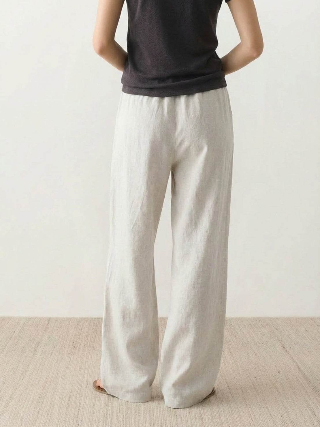 100% linen wide-leg pants with elastic high-rise waist and side pockets