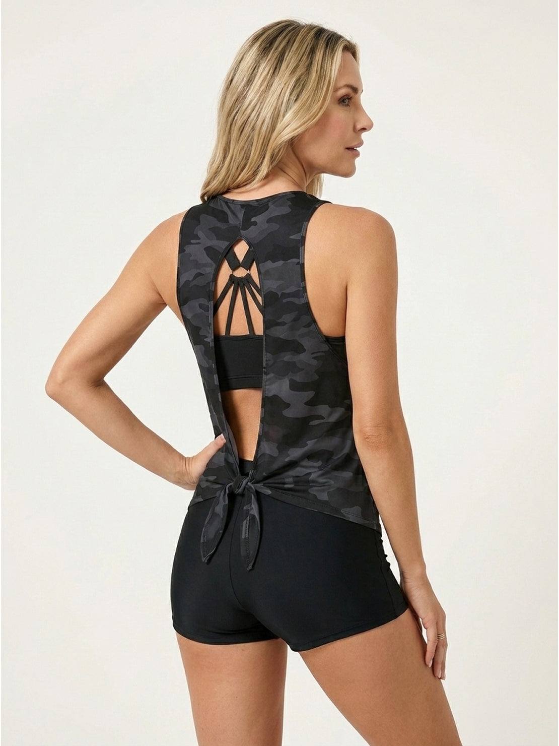 Three-piece open-back swim set with loose tank, racerback crop bra, and boy-short swim shorts