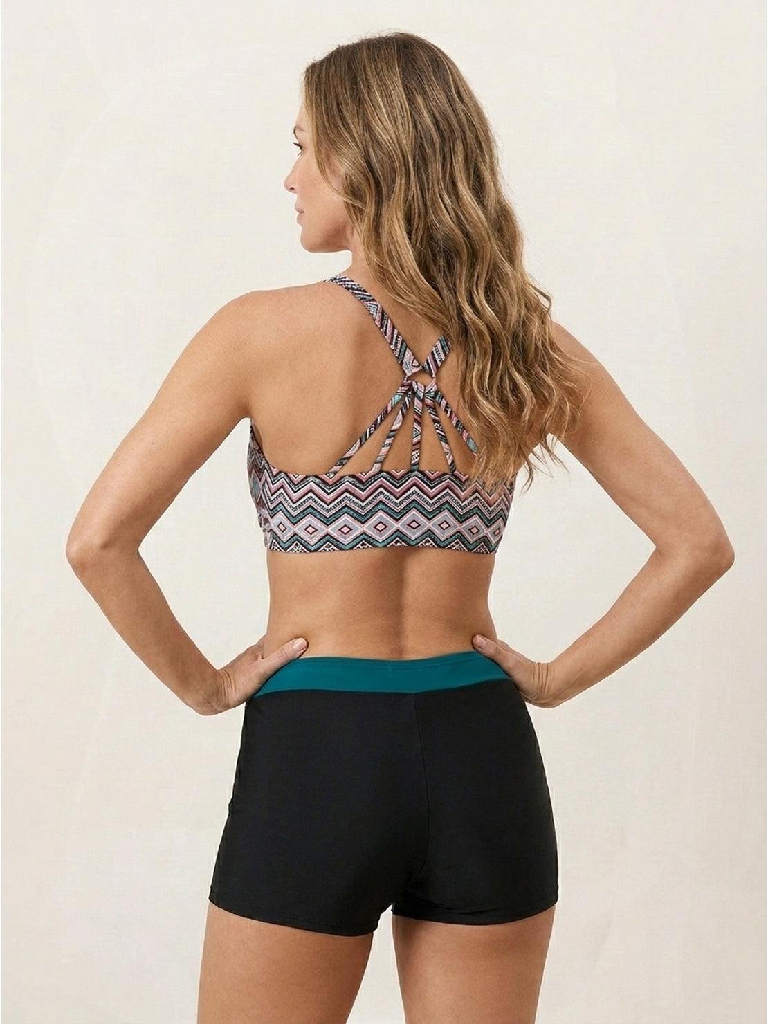 Three-piece open-back swim set with loose scoop-neck tank, printed racerback crop bra, and mid-rise boy shorts