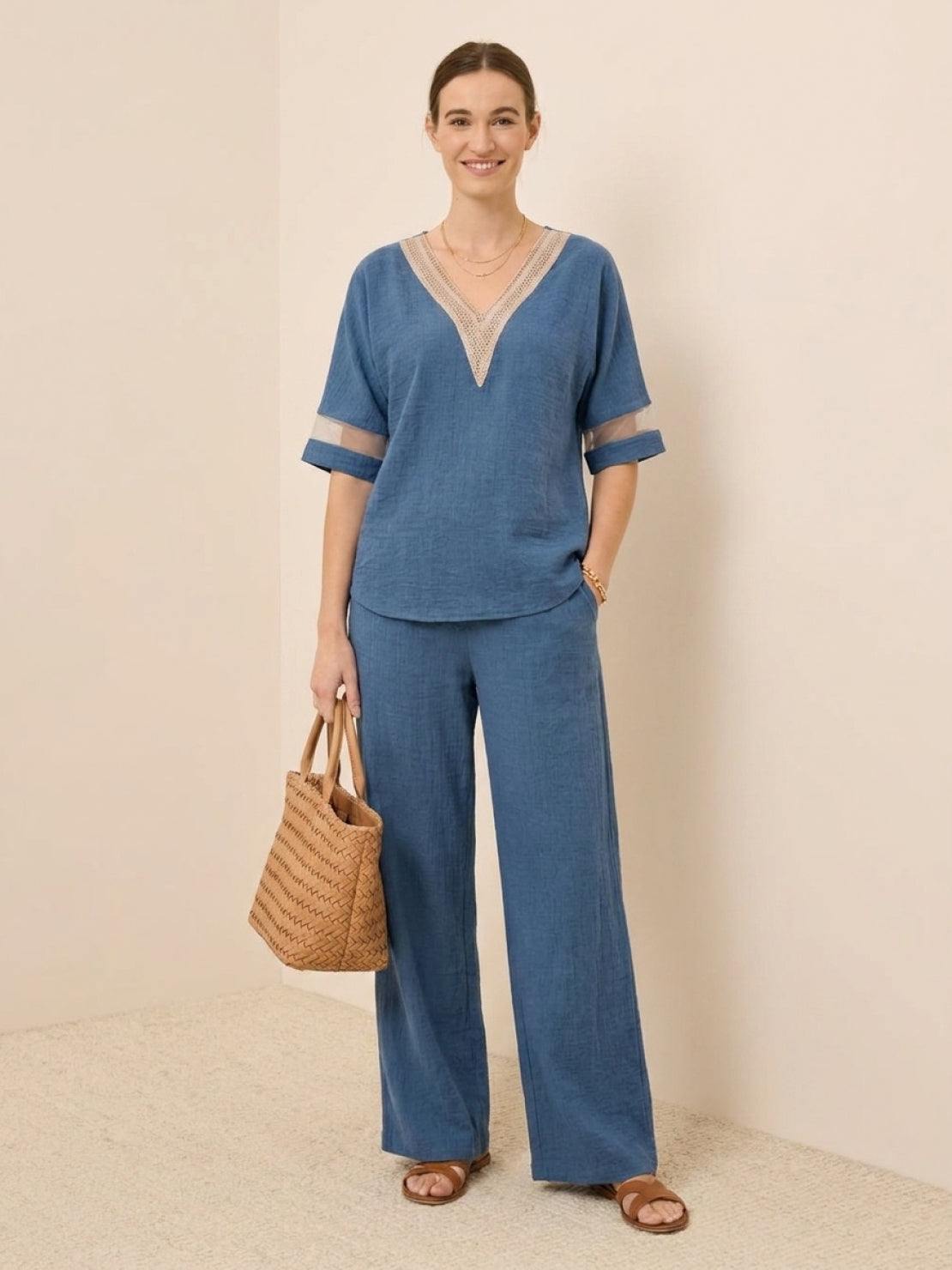 Lightweight linen top with relaxed boxy fit and button detail for mature women