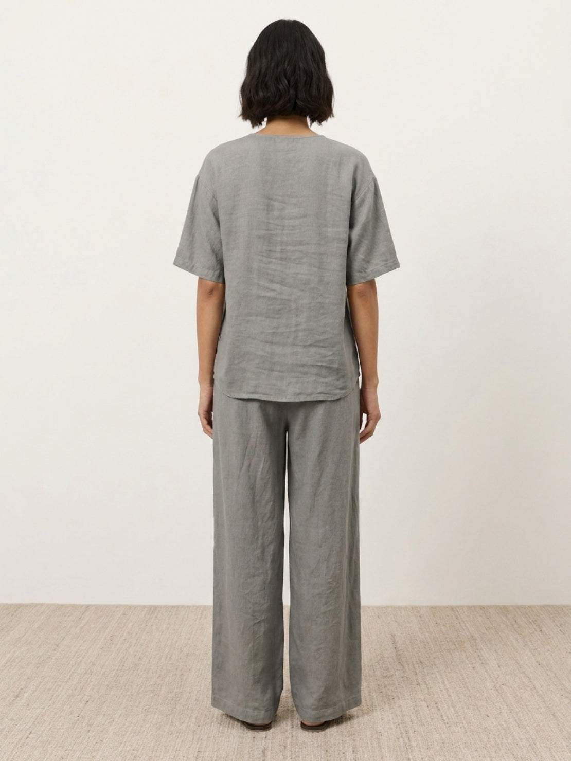 comfortable 100% cotton two-piece set with button-front top and wide-leg pants in soft solid colors