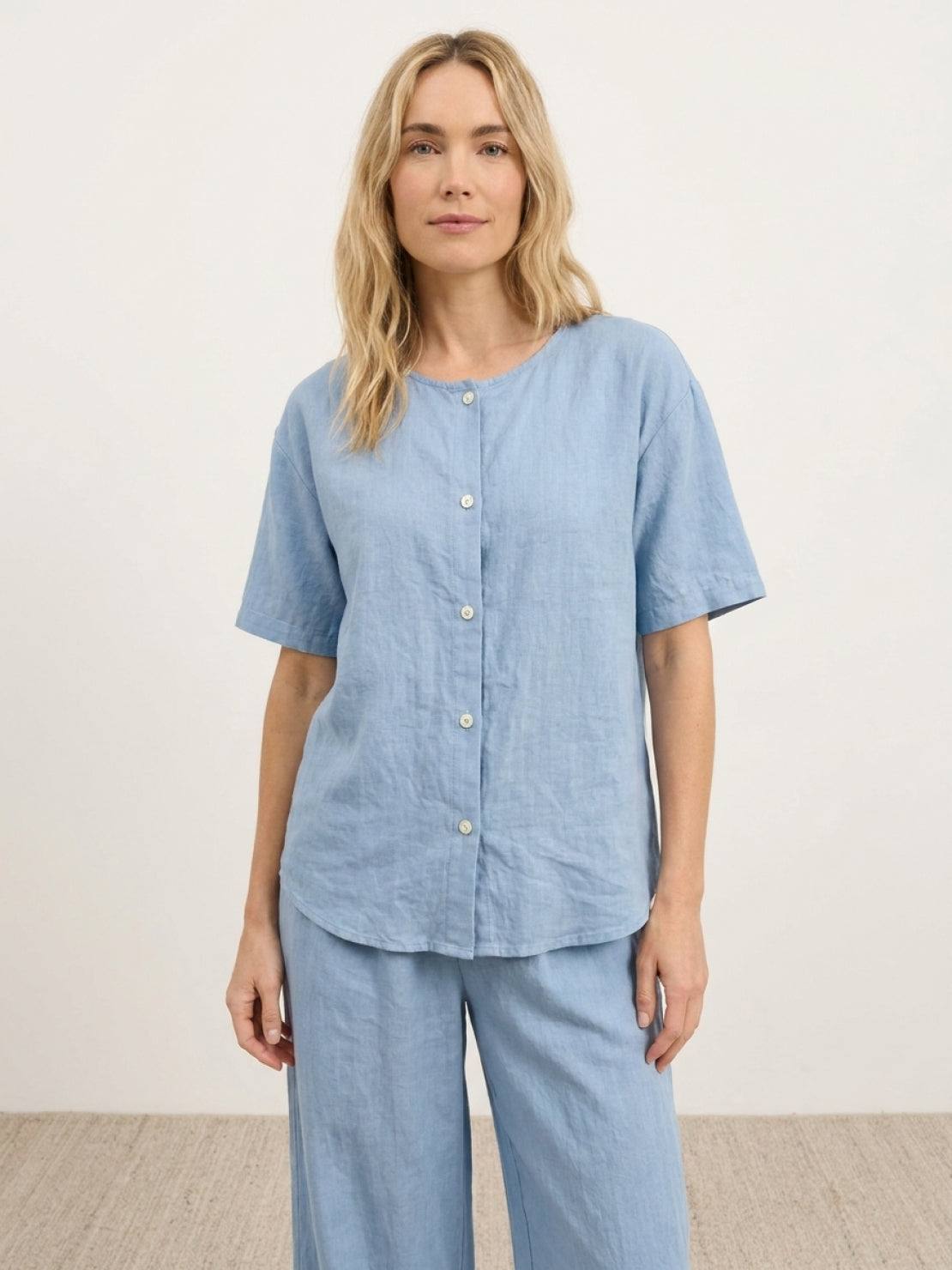 100% cotton two-piece set with button-front top and wide-leg pants in soft solid colors