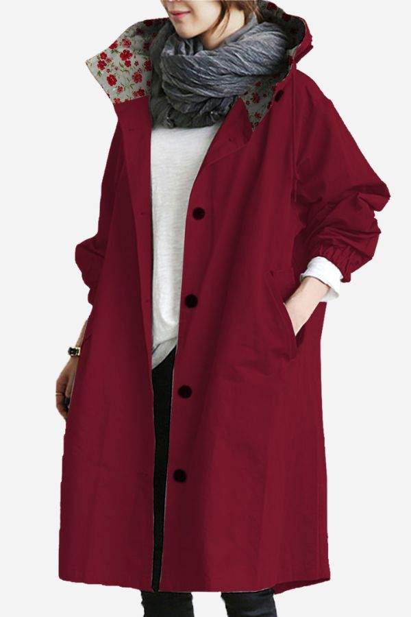 Water resistant oversized windbreaker jacket in burgundy with hood and button closure
