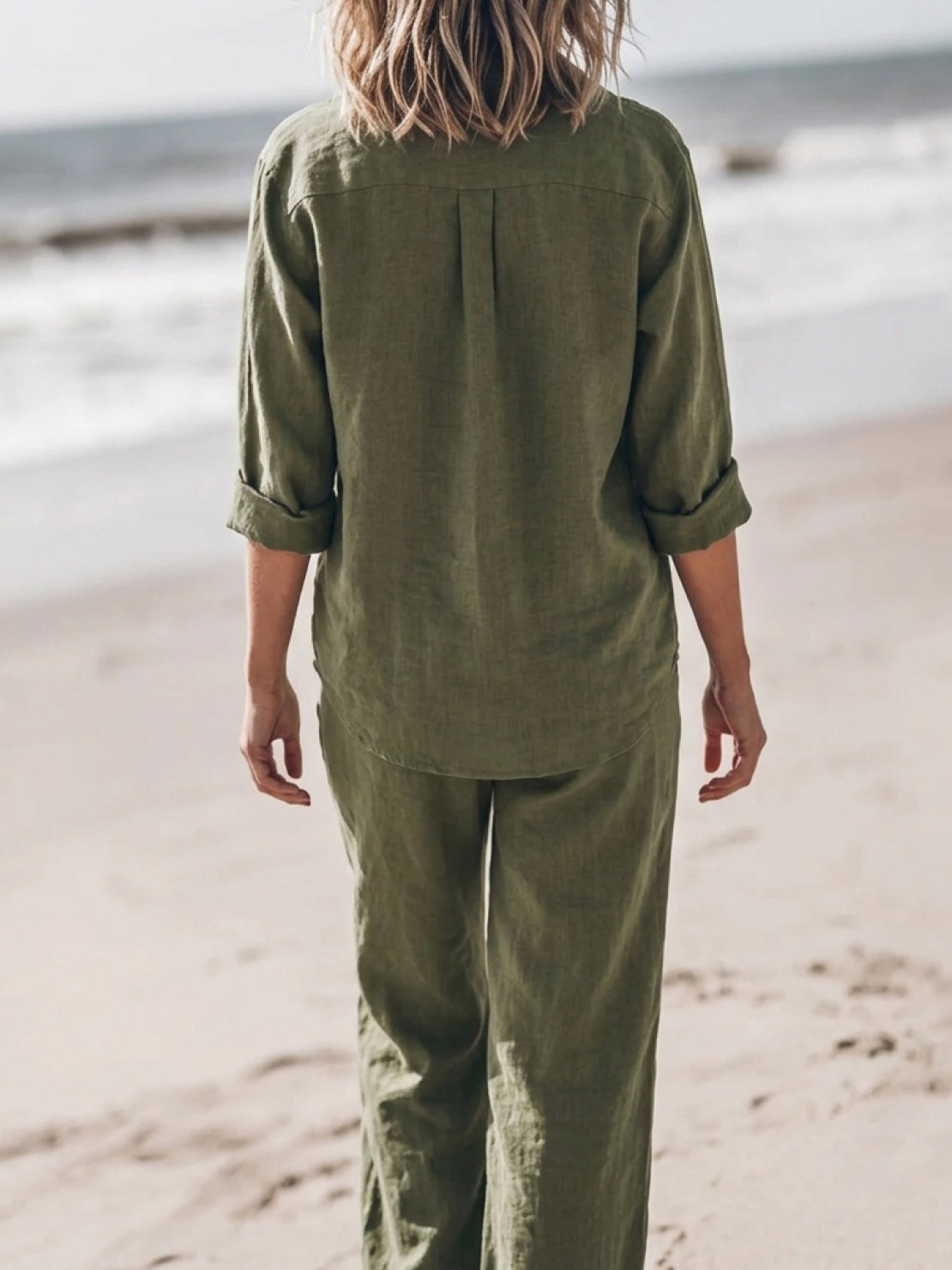 Woman wearing oversized 100% cotton shirt and wide-leg pants co-ord set in relaxed style