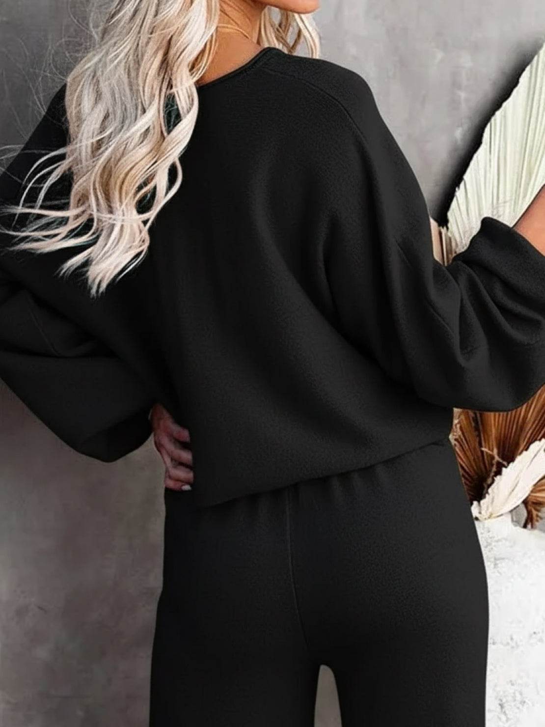 Black round neck loose fit cozy two-piece set with long sleeves and wide-leg pants for casual wear